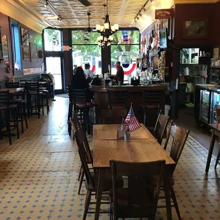 tables and chairs with american flags on them
