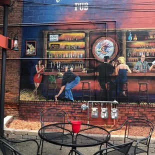 Mural on wall of outdoor beer garden