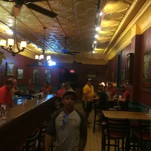 people sitting at the bar