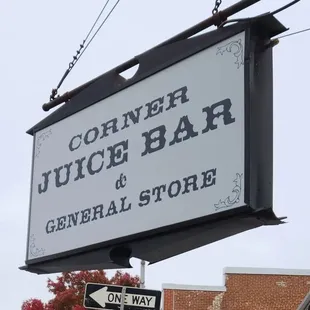 sign for corner juice bar and general store