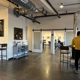 a man standing at a bar