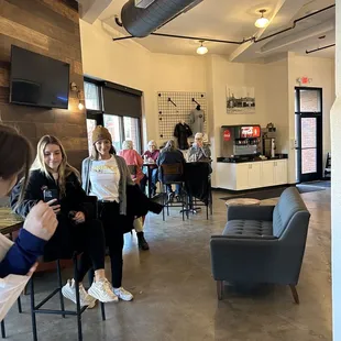 a group of people sitting at tables