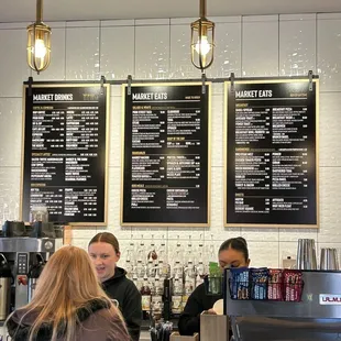 menus on the wall of a coffee shop