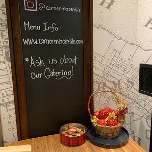 a basket of strawberries on a table