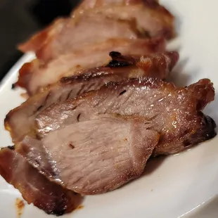 two slices of meat on a plate