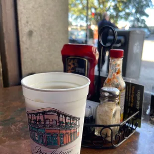 a cup of coffee on a table