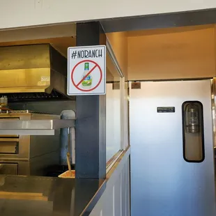 a no lunch sign in a kitchen