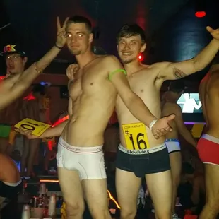 a group of men in underwear