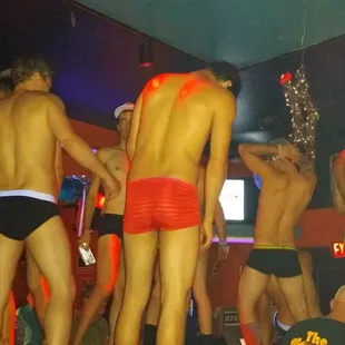 a group of men in underwear