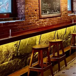 The only spare stools on this beautiful wall at the Corner Tavern.