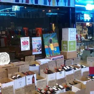 rows of wine bottles in boxes