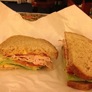 The stadium (lettuce, tomato, bacon, avocado, peppered turkey, and spicy Russian dressing)