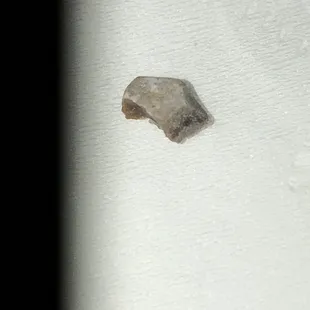 a rock in the snow
