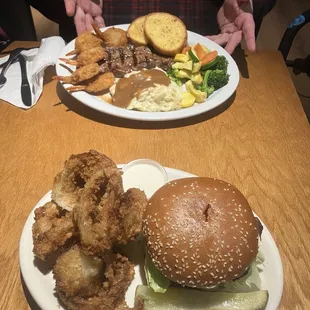 This is the Swiss mushroom burger, and onion rings And then the other one is the New York steak and shrimp
