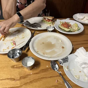 What&apos;s left of the short stack sausage combo, BLT, Sante Fe Chicken Sandwich, house salad, and garlic fries.