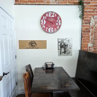 a brick wall with a clock on it