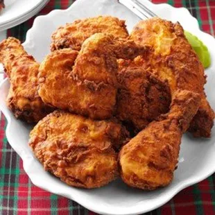 a plate of fried chicken wings