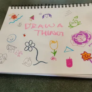 community sketch pad at the register
