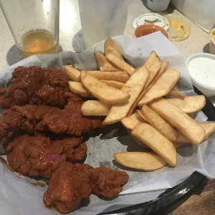 Buffalo chicken tenders with steak fries !