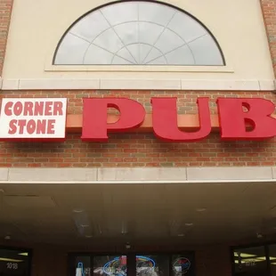 the entrance to a brick building