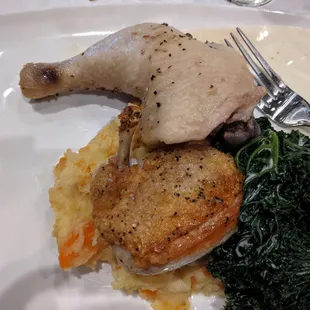 An obviously uncooked chicken leg.