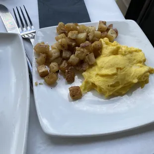 Eggs and potatoes that came with the stuffed French toast
