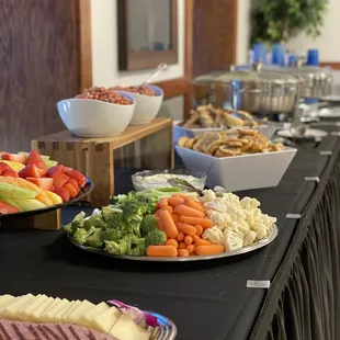 a variety of foods on a buffet table