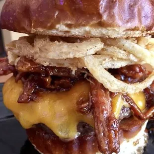 Dr. Pepper Haystack burger on a toasted Milwaukee Pretzel bun.