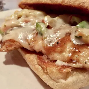 Caribbean jerk chicken on a toasted chibata roll.