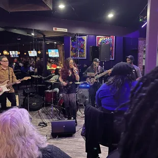 a group of people playing music