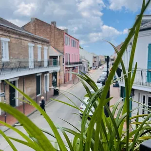 a view of a city street from a balcony