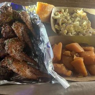 Fried chicken with bourbon glaze, sweet potatoes, Mac and Cheese with cornbread.