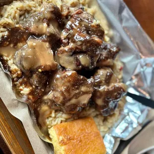 a closeup of the meat and rice dish