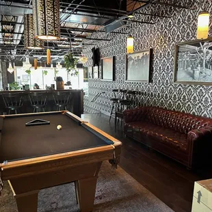 Up a landing is this pool area.