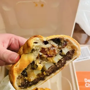 The Royale! Ground beef, cheese, potatoes, bacon and dressing on the side!