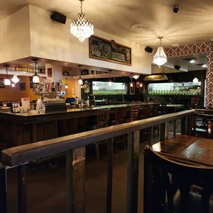 a view of the bar and dining area