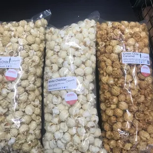 three bags of cornivore popcorn