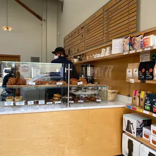 a woman behind a counter