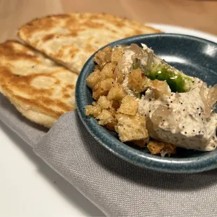 Potato naan, mushroom butter, fig leaf oil