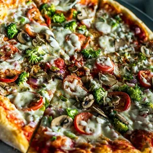 Corolla Pizza &amp; Deli&apos;s supreme pizza with thick crust.