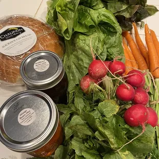 Honey, sourdough bread, radishes, carrots, lettuce