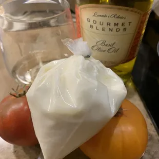 burrata and fresh tomatoes and the basil olive oil all from the market today
