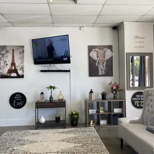 a living room with couches and a television