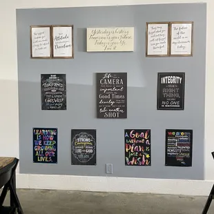 a variety of signs on a wall