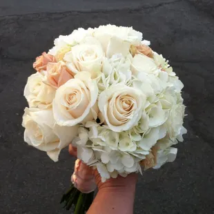 A touch of blush accents this Bridal Bouquet