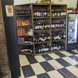 a wine shop with a checkered floor