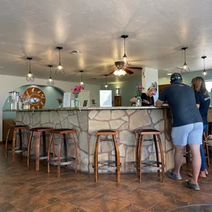a group of people at the bar
