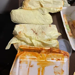 a variety of burritos