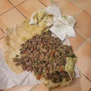 Greasy meat and soggy tortillas.