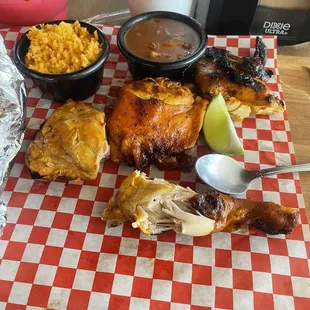 Half chicken with rice and beans.